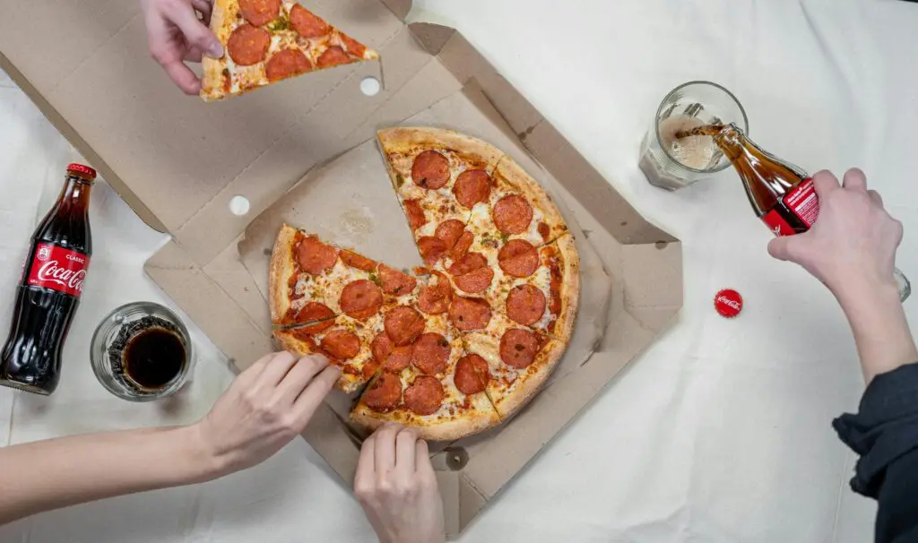 Are Your Health Problems Really Genetic? Discover the Hidden Factors Shaping Your Well-Being junk food pizza